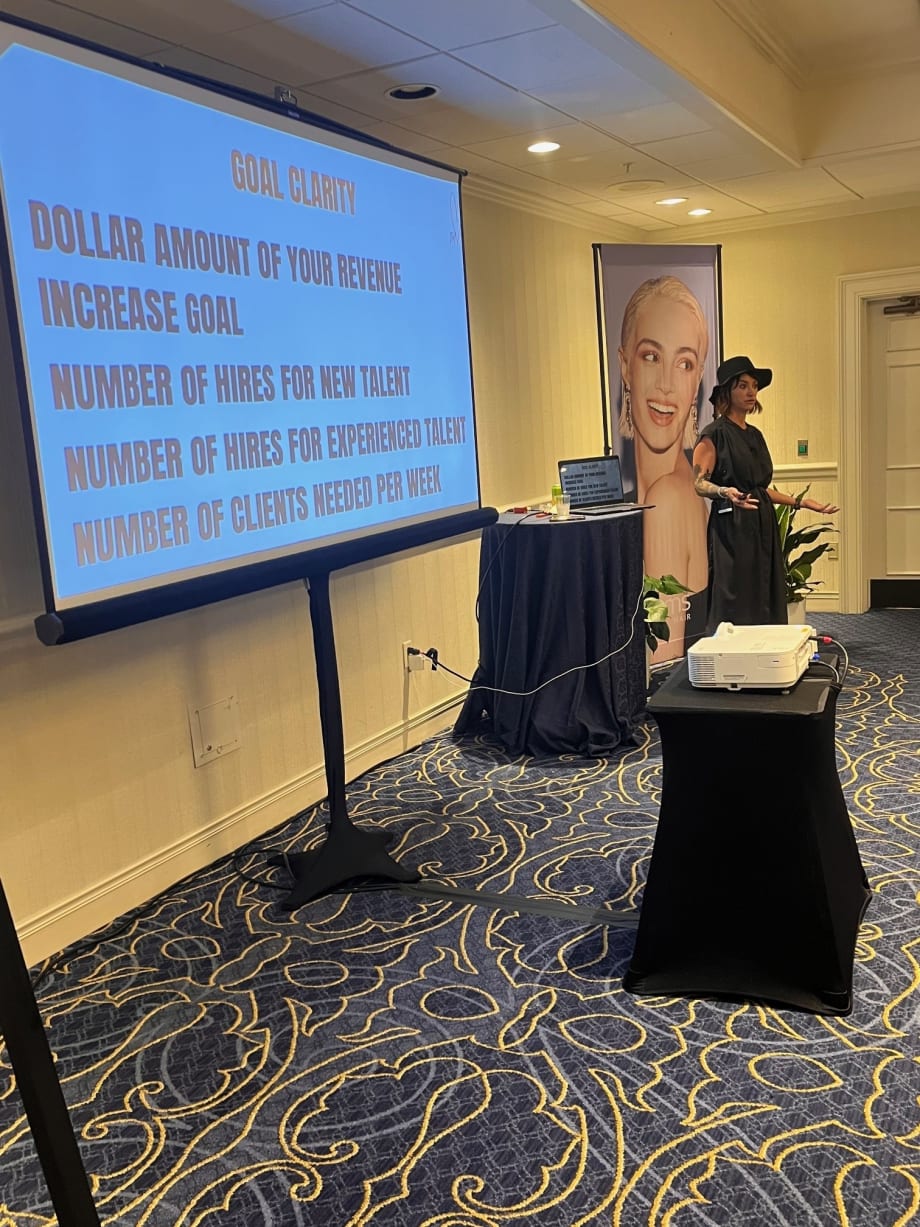 A woman teaching.