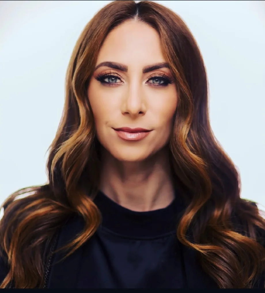 A woman with long brunette hair