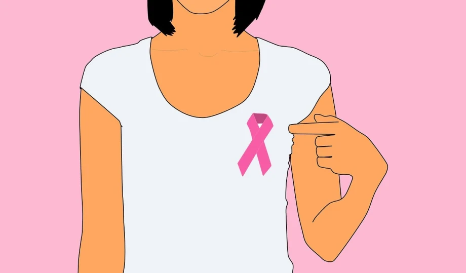 A graphic of a woman pointing to a pink cancer awareness ribbon pinned to her chest.