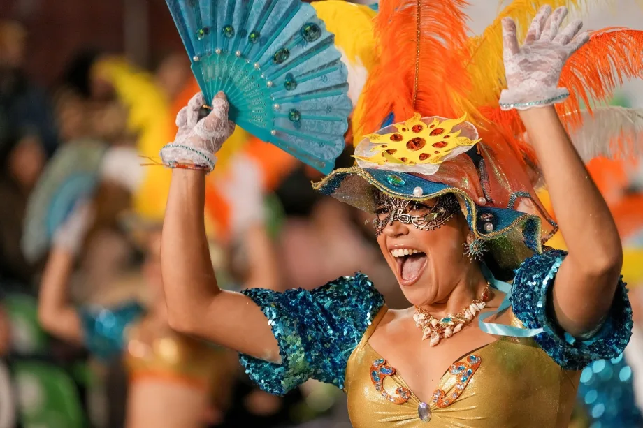 A woman in costume celebrates