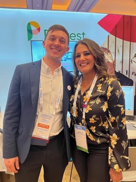 A smiling man and woman