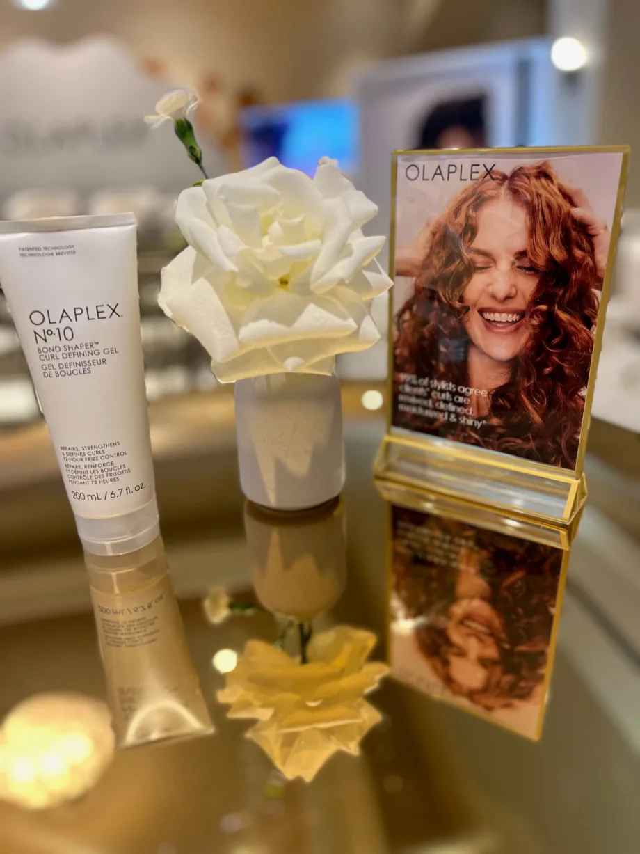 A hair care product on a mirror.