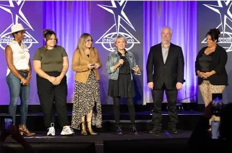 Teachers on stage at last year's Intercoiffure