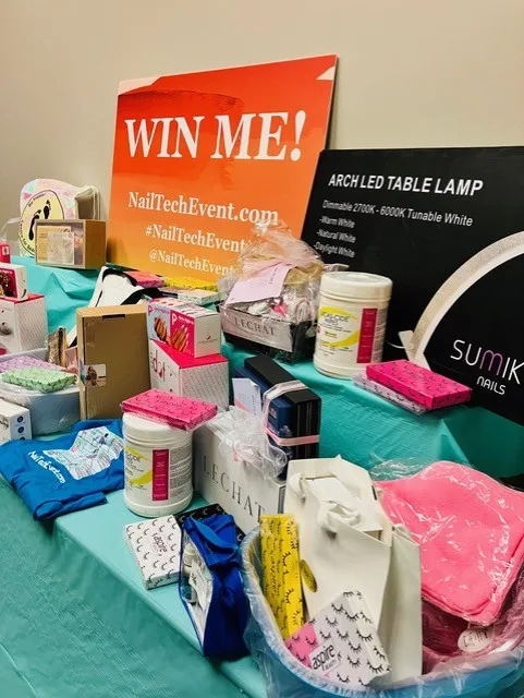 A display of colorful nail product prizes arranged for giveaway during the event.