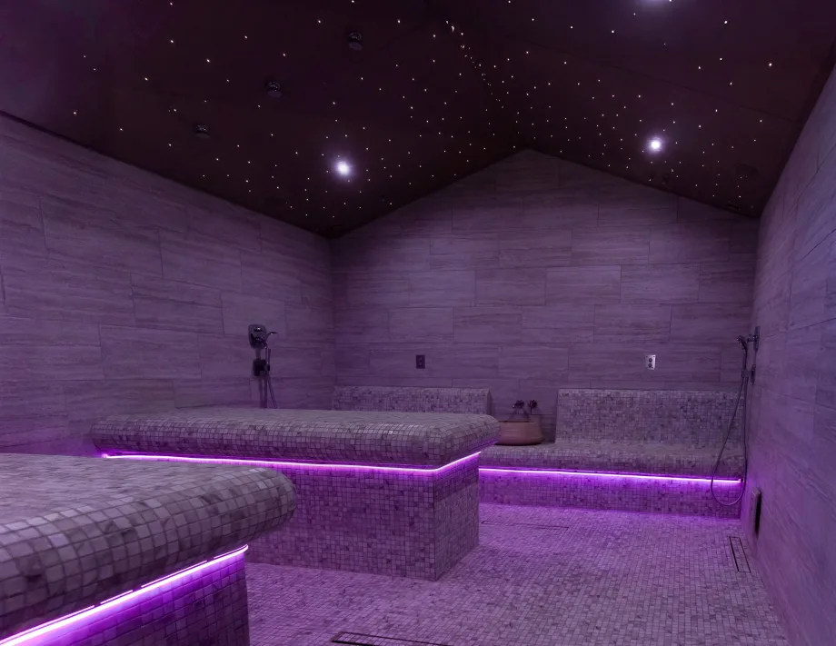 A dimly lit room resembles twilight in Excuria's Turkish Bath Room.