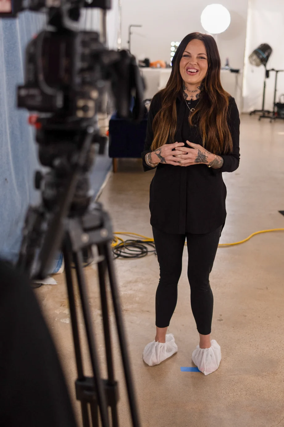 Reva Haga is being interviewed on the set of the Modern Salon and Ulta Beauty photo shoot.